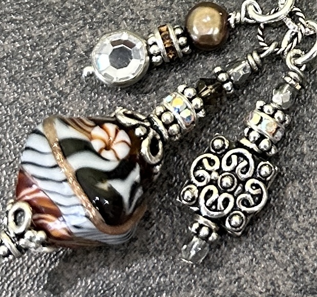 Animal Print Charming Art Glass Adjustable Necklace-This necklace design is on a 24 adjustable sterling silver Italian box chain. Wear these charming de